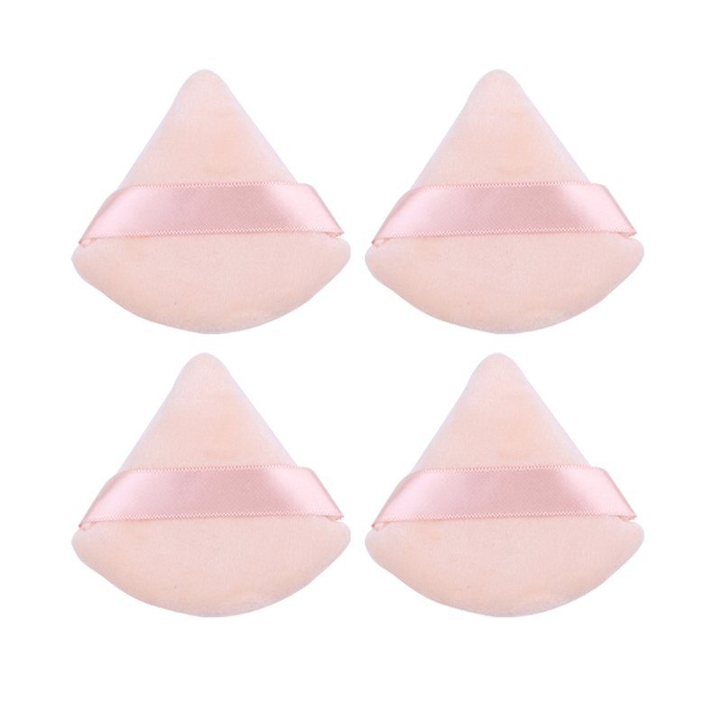 A versatilidade das esponjas de pó triangular em detalhes de maquiagem facial